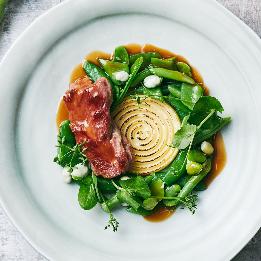 Lams procureur met Malagawijn, gebrande polenta en groene groenten
